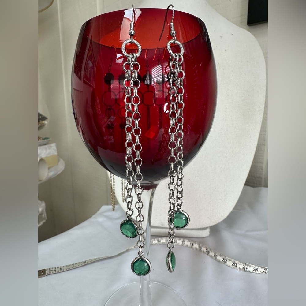 Long silvertone chain dangle earrings with green beads